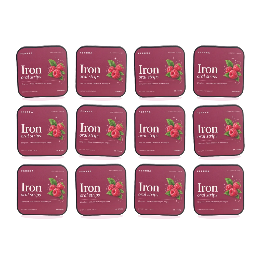 Twelve tins of Ferrra Iron oral strips arranged together — a twelve month supply.
