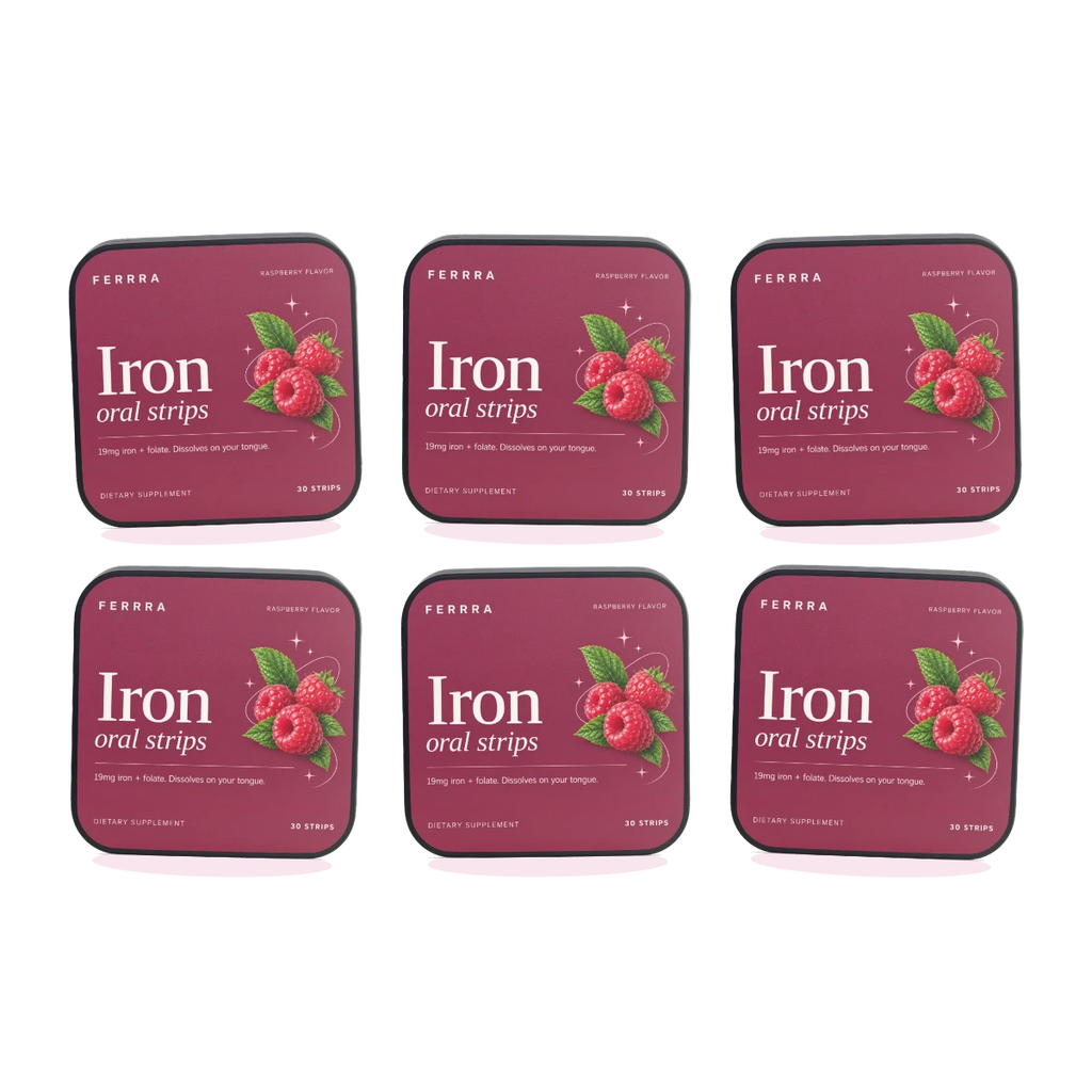 Six tins of Ferrra Iron oral strips arranged together — a six month supply.